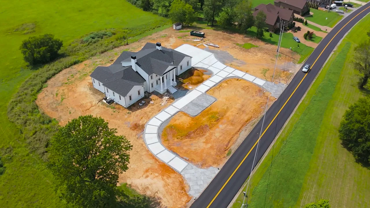 After: finished curved driveway with contrasting patterned borders