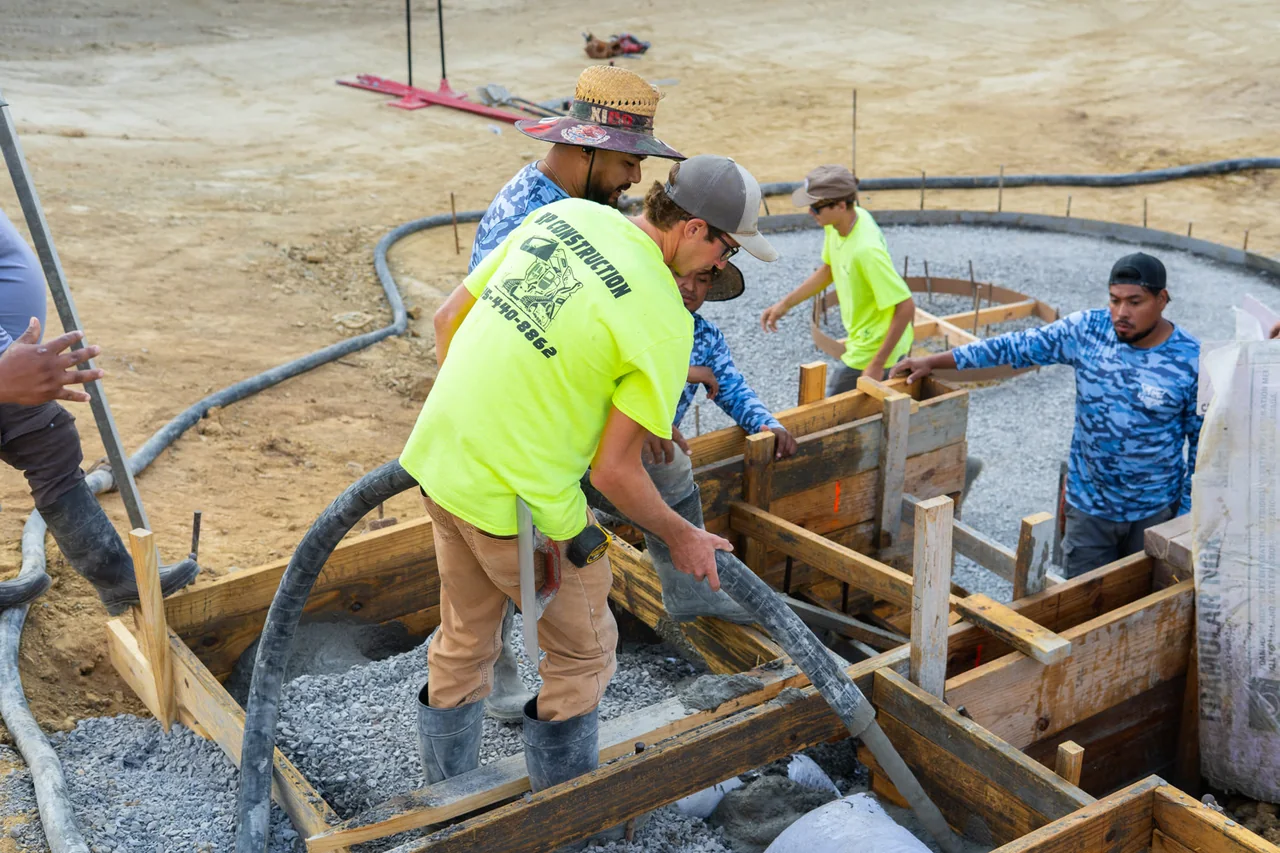 BP crew pouring formed concrete steps