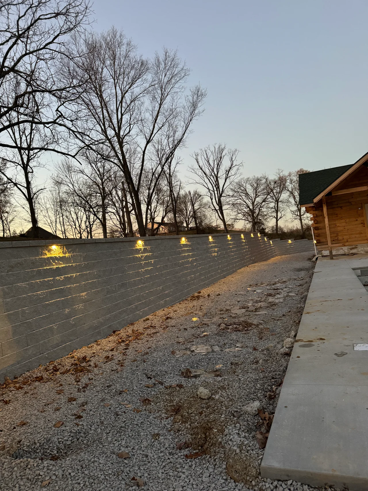 Close view of the retaining wall with lights along its face